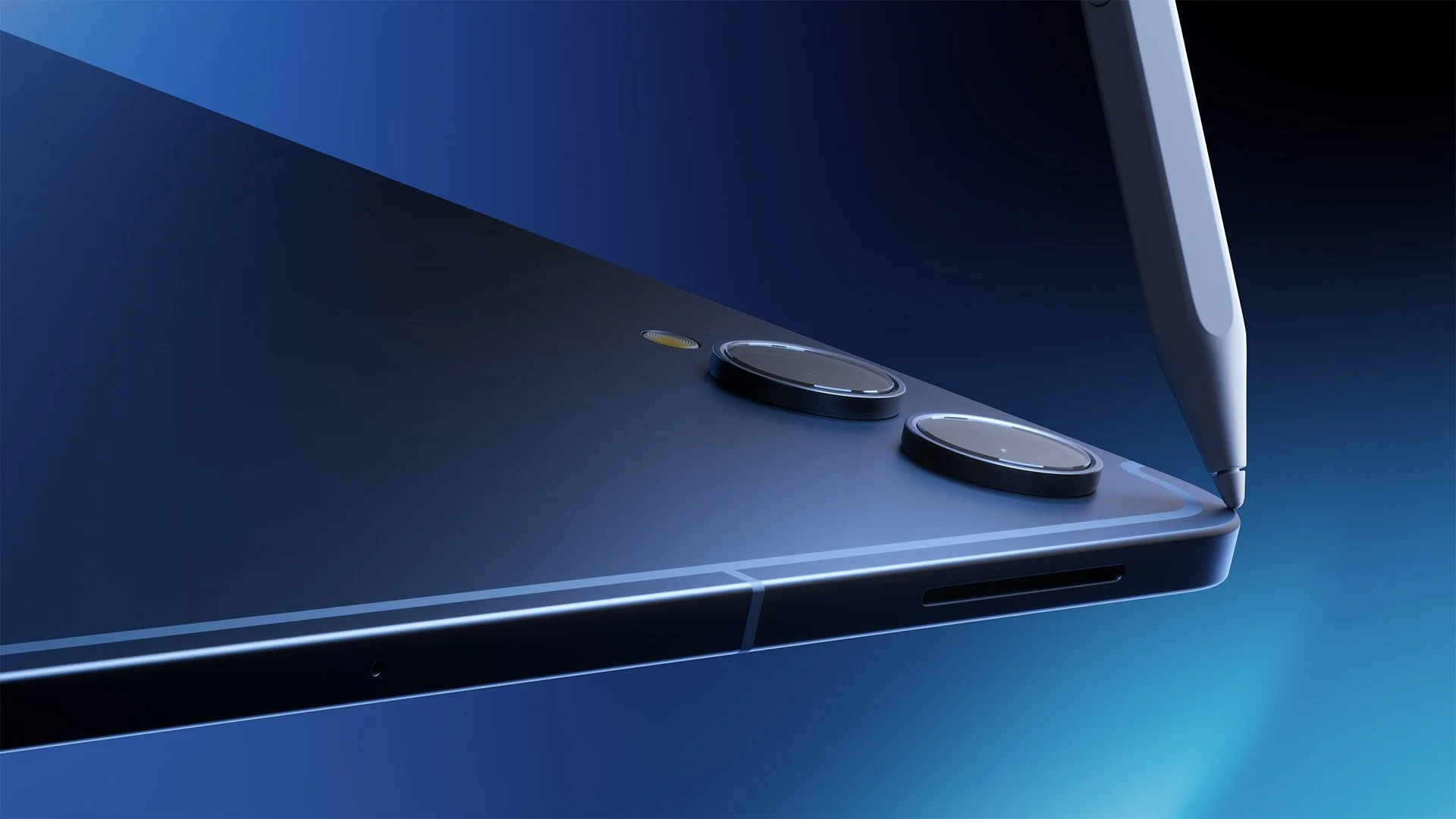 Close-up of a laptop with a stylus pen positioned near the screen and two buttons on the keyboard.