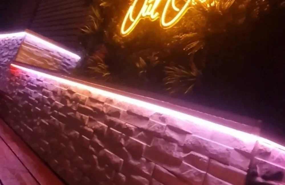 Bespoke illuminated garden feature designed for an outdoor entertaining space