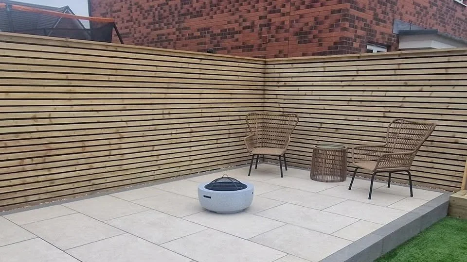 Porcelain paving installed within an enclosed garden