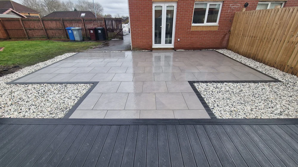 Grey porcelain paving with decorative gravel borders