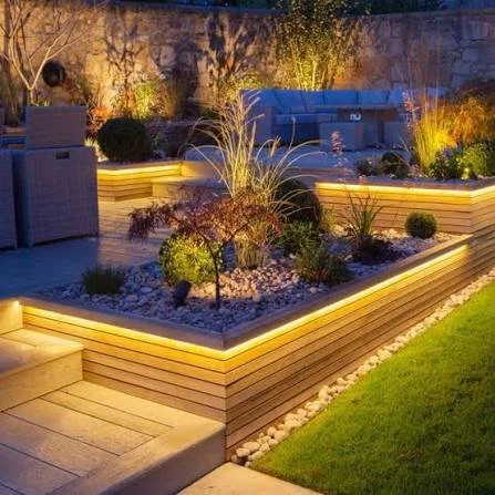 Garden lighting within a landscaped garden