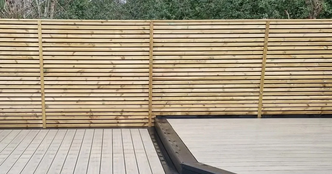 Contemporary horizontal timber fencing installed by Team Bespoke