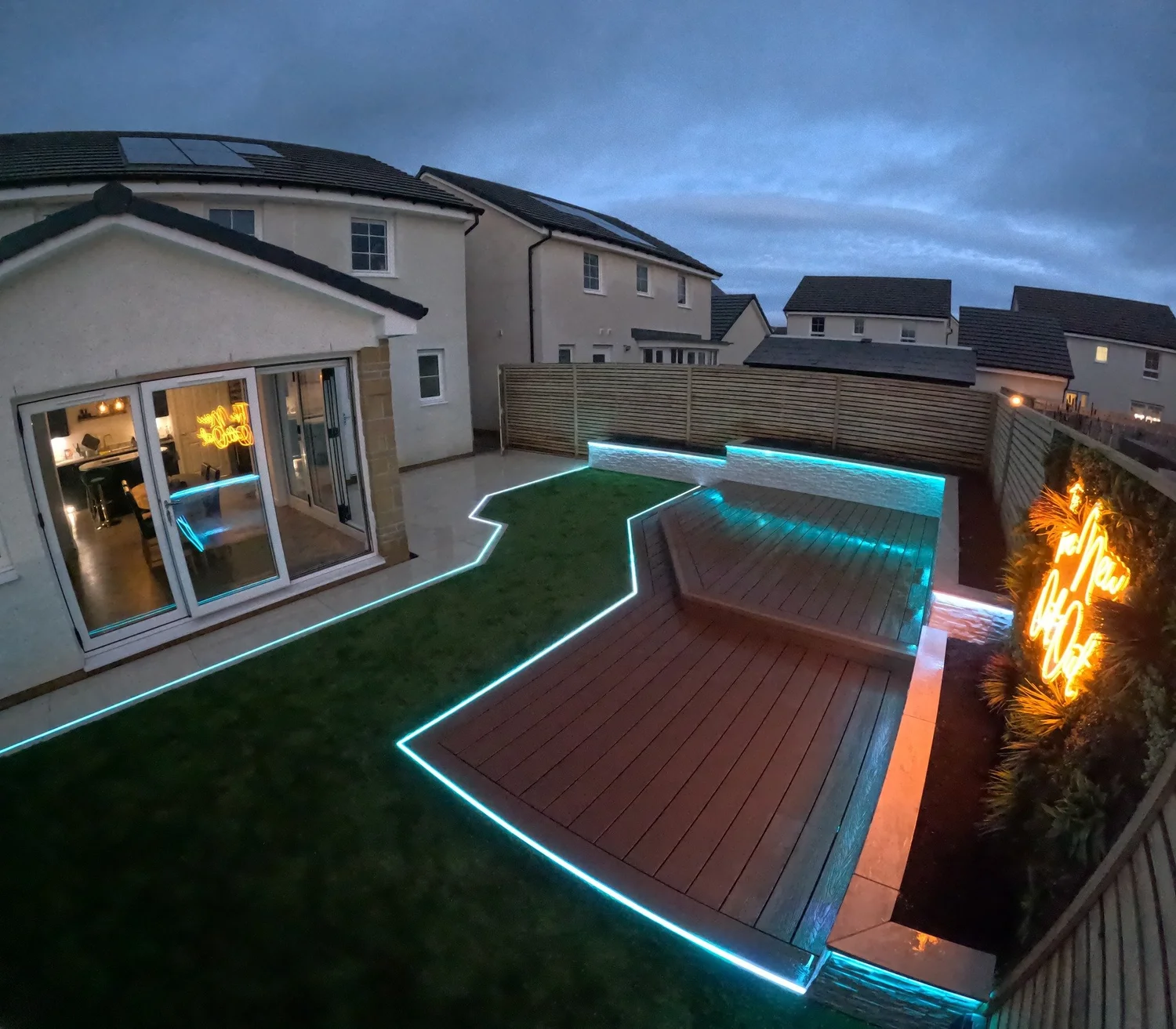 Garden lighting illuminating a landscaped garden by Team Bespoke