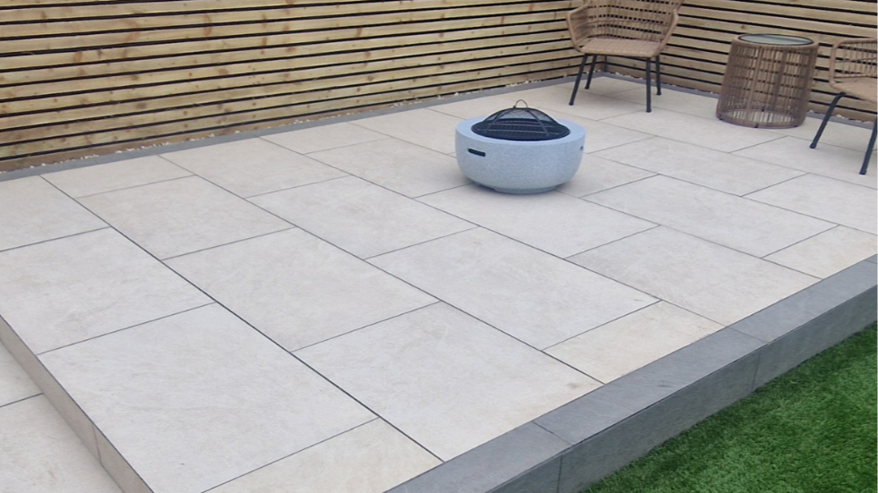 Light porcelain patio with outdoor fire pit