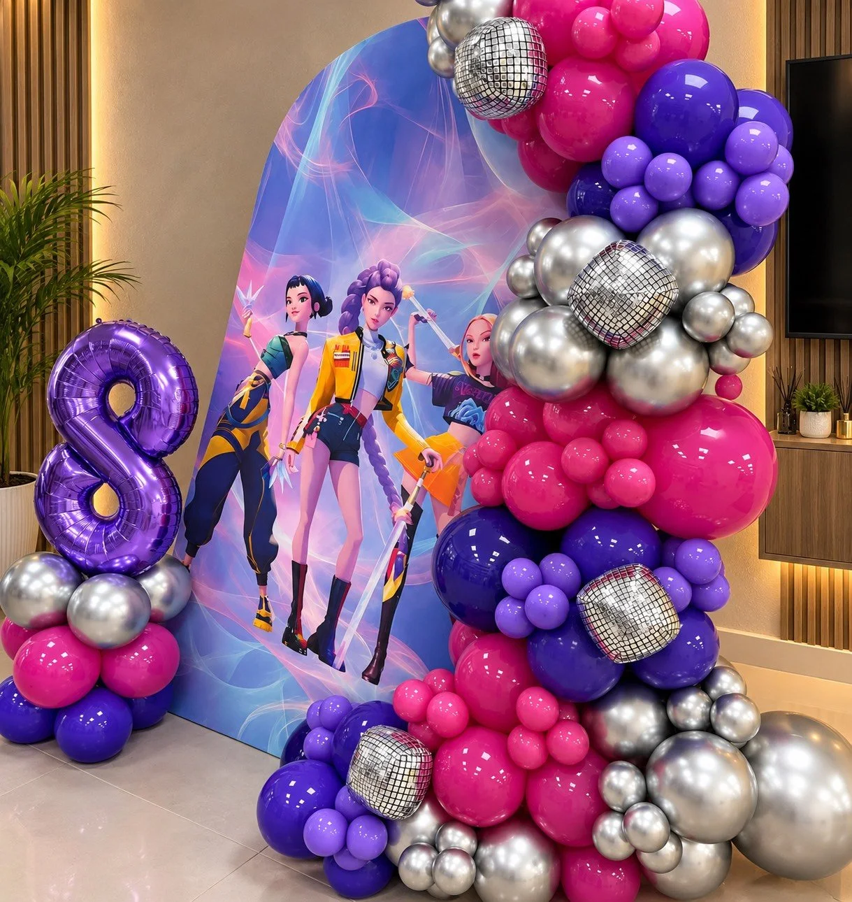 Decorative setup with a HuntrX featuring bundance of balloons in pink, purple and silver including a large number 8 balloon in purple, for an 8th birthday celebration for one KPOP demon hunters fan.