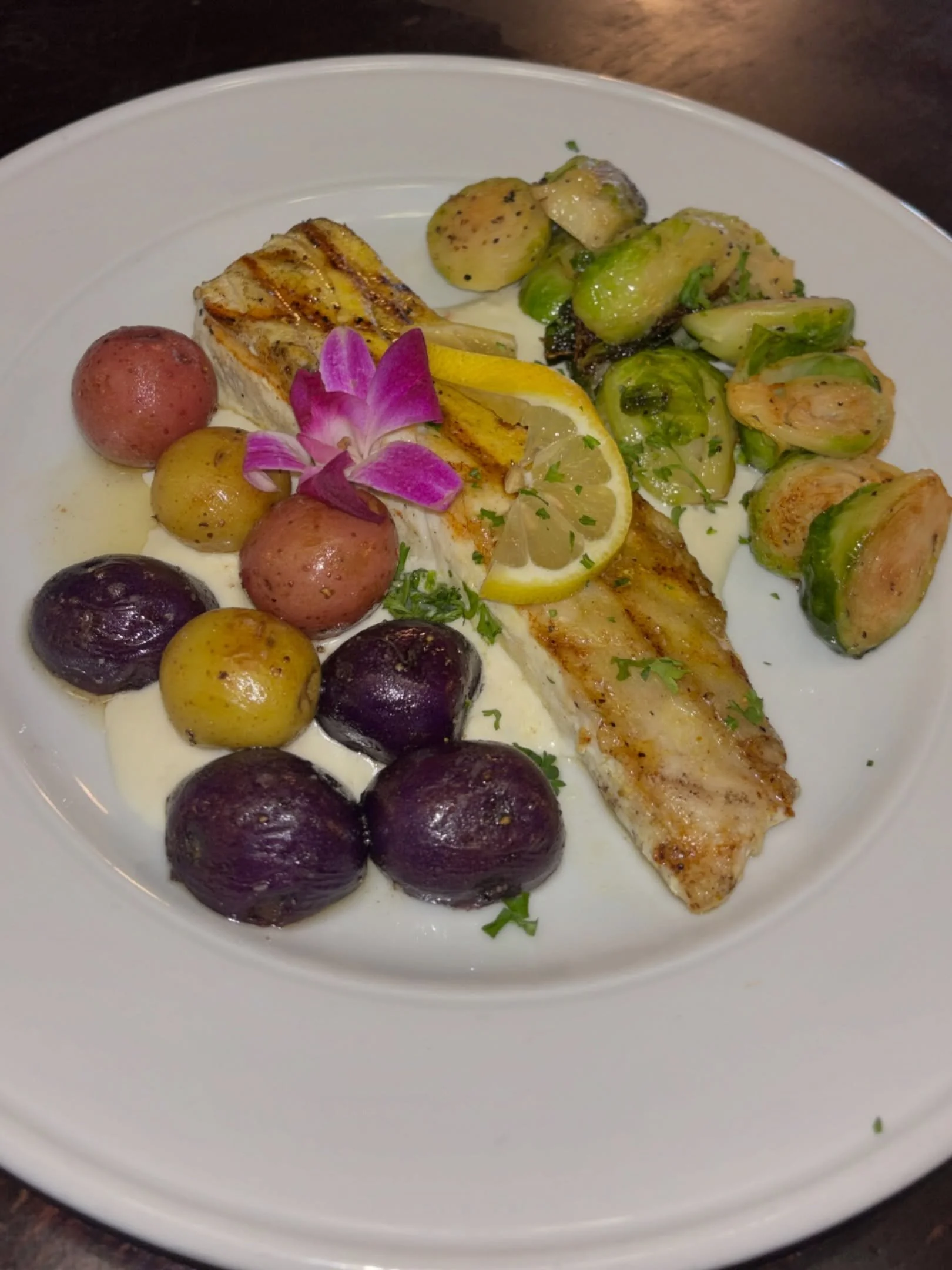 Join us this Mother&rsquo;s Day weekend to enjoy this delicious chef&rsquo;s special! 🌺 Fresh caught halibut with saut&eacute;ed Brussels and baby potatoes served atop a shallot b&eacute;chamel sauce. Available for dine-in and take-out. $38