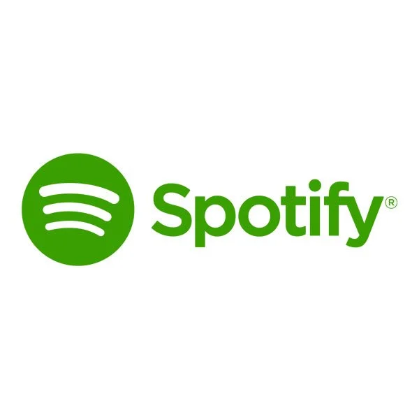 Spotify logo with green circle and white sound wave icon next to the word 'Spotify' in green text.
