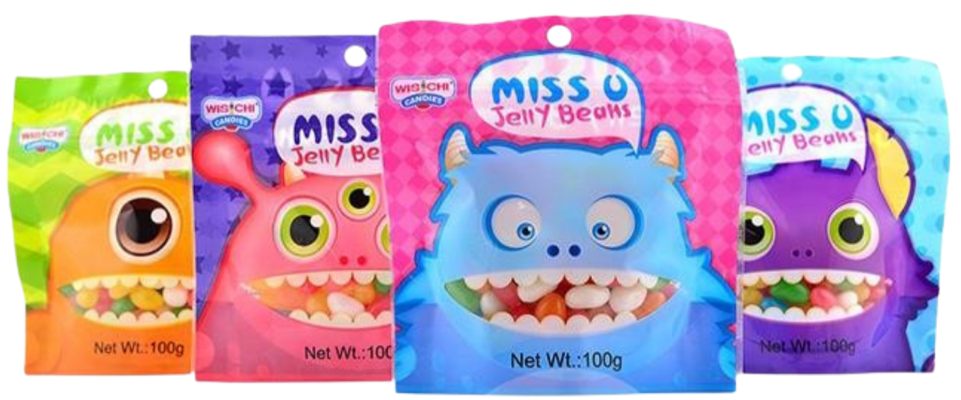 Four colorful packages of Miss U Jelly Beans with cartoon monster faces in yellow, pink, blue, and purple packaging.