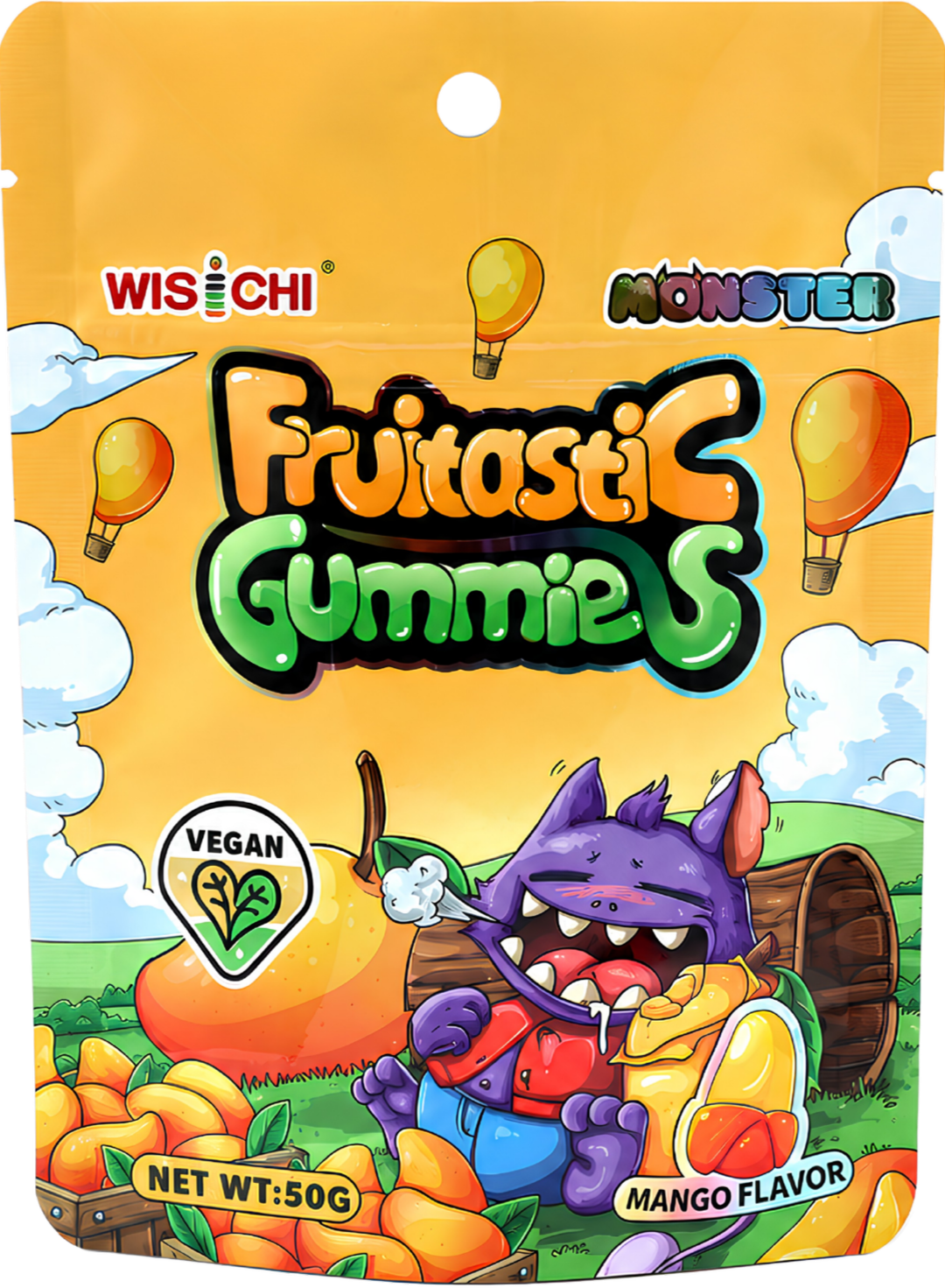 Colorful package of Fruityastic Gummies with mango flavor. Features a cartoon purple monster with big teeth, holding a mango and surrounded by mangoes and clouds, with a vegan symbol. The package has a bright yellow background.
