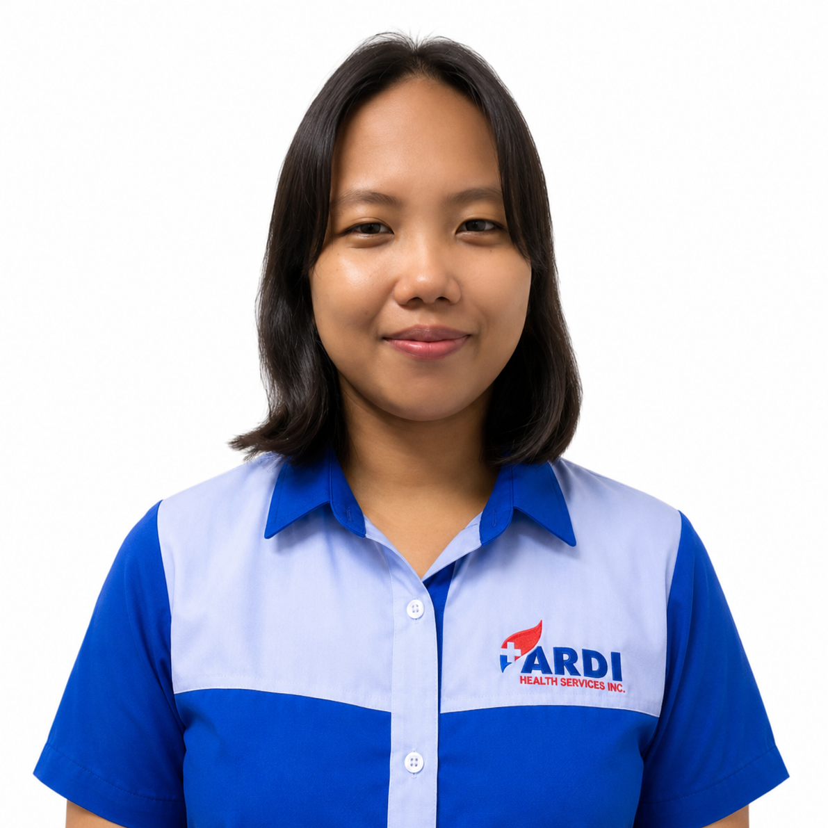 A woman with shoulder-length dark hair, wearing a blue and white uniform shirt with a logo that reads 'ARDI' and 'Health Services Inc.', smiling slightly against a plain white background.