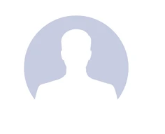 Silhouette of a person against a circular background.