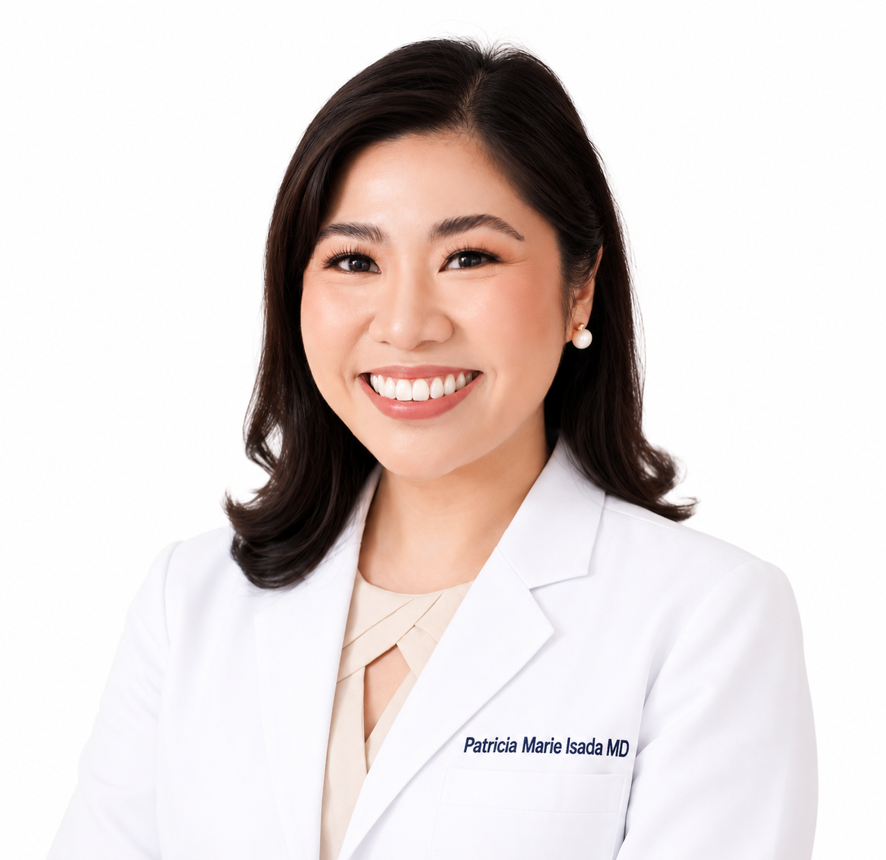 Portrait of a smiling female doctor with shoulder-length dark hair wearing a white coat and pearl earrings, against a white background.
