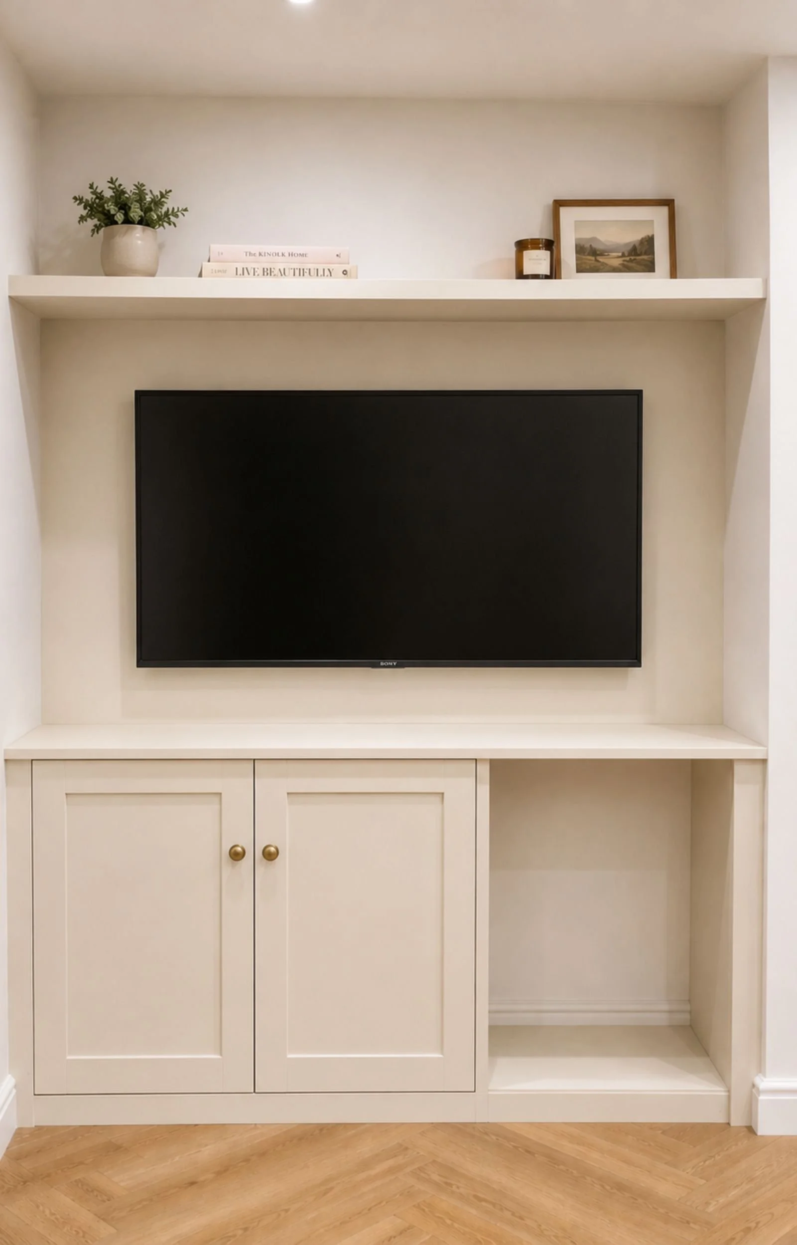 Built-in MDF TV cabinet with closed cupboard doors and open shelving above, supplied as a made-to-measure DIY kit.