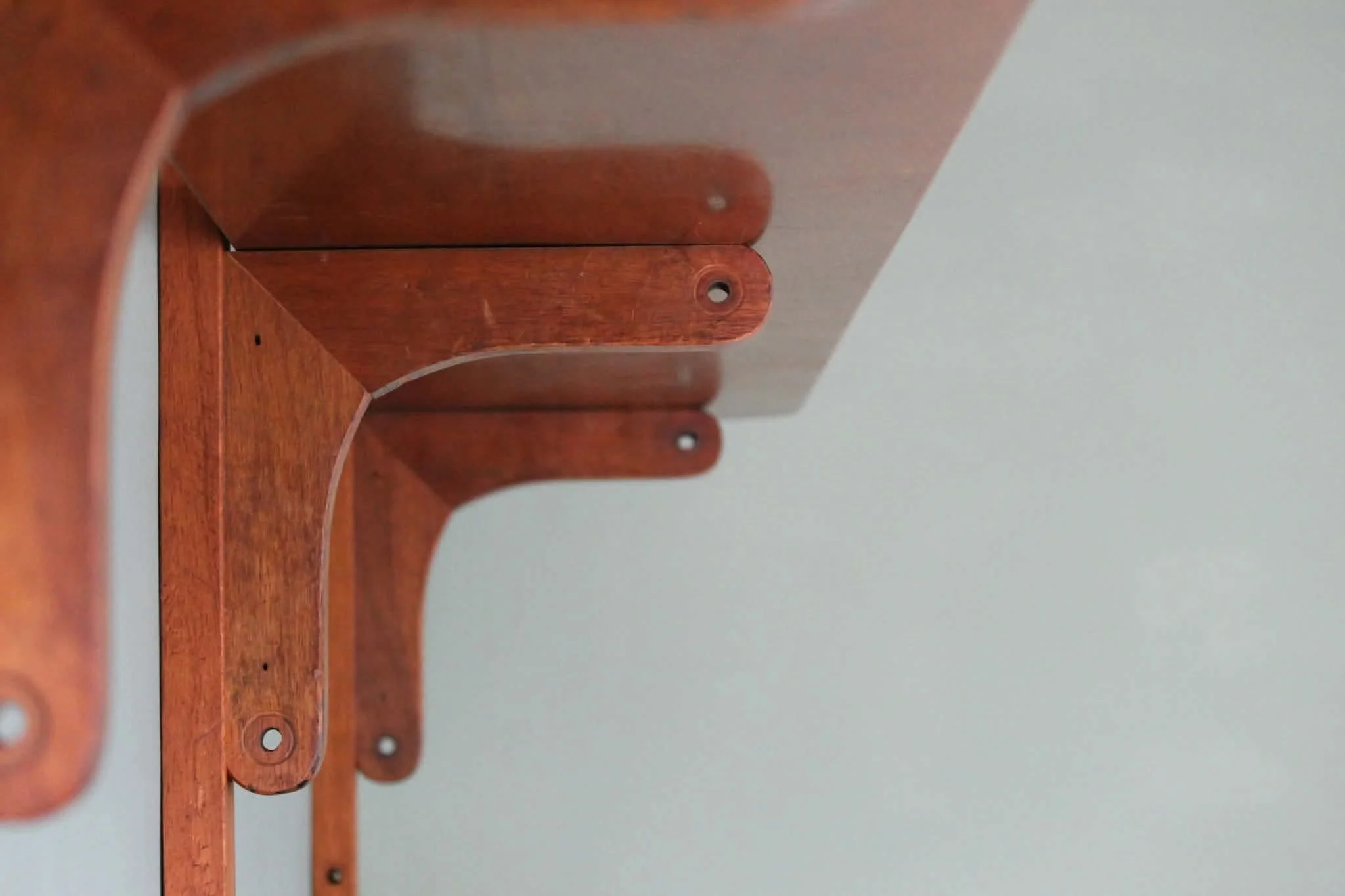 pew-shelf-brackets-underside.jpg