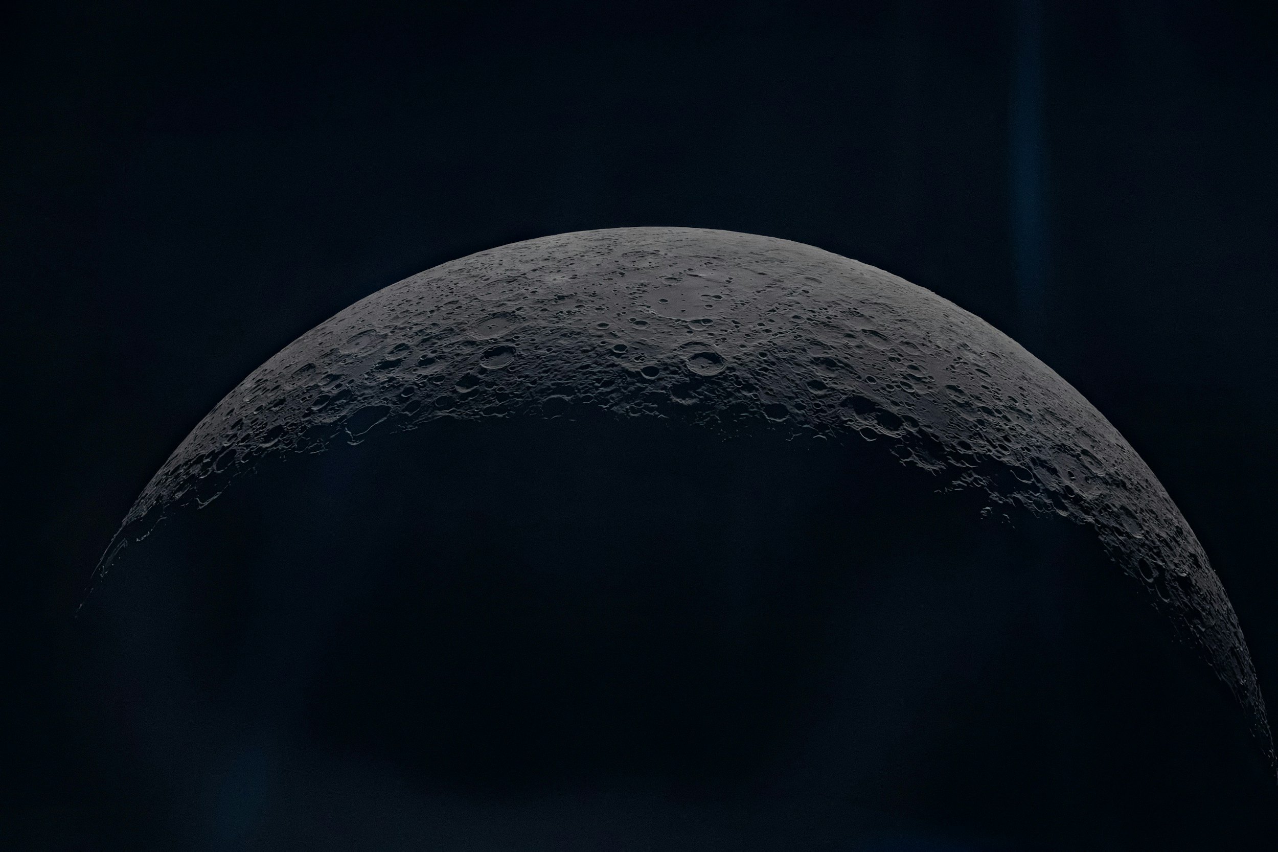 Half of the moon closeup against a black sky