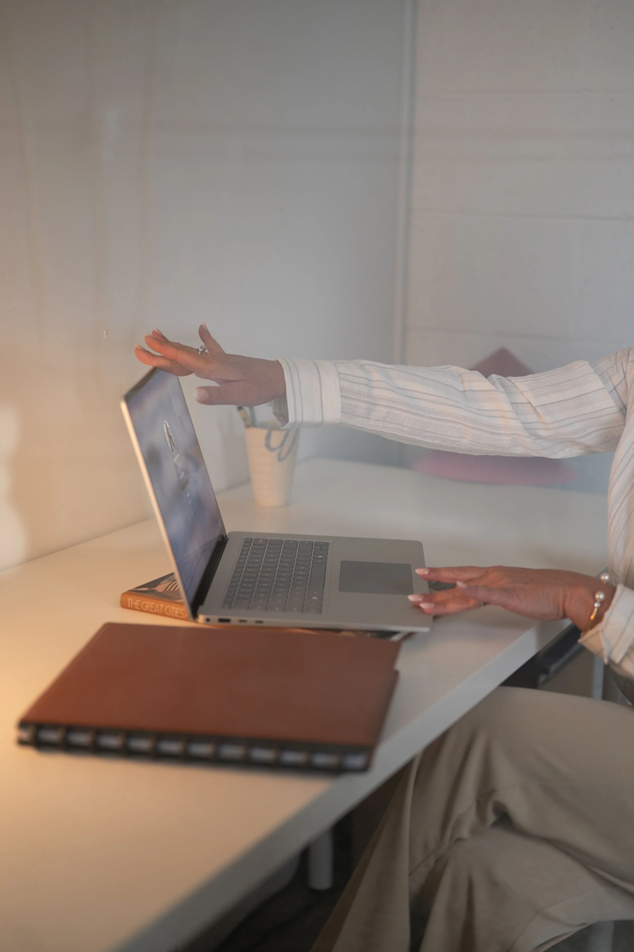 Business woman opening laptop to work