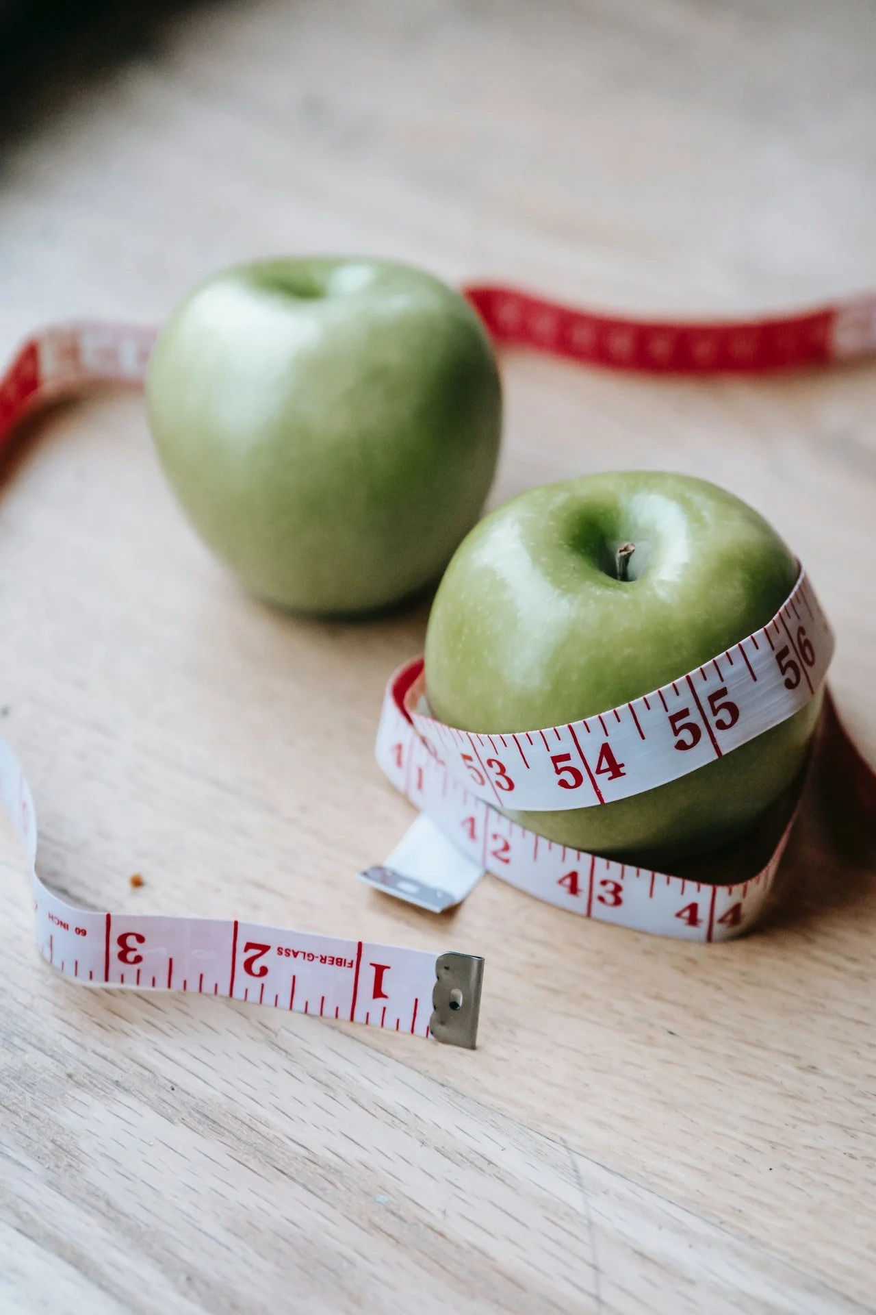 apples with tape measure