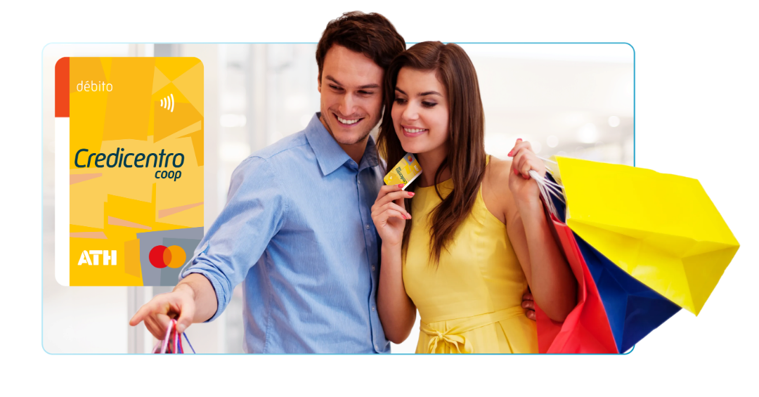A happy couple shopping in a store, holding shopping bags and a credit card, with a yellow credit card from Credicentro Coop in the background.
