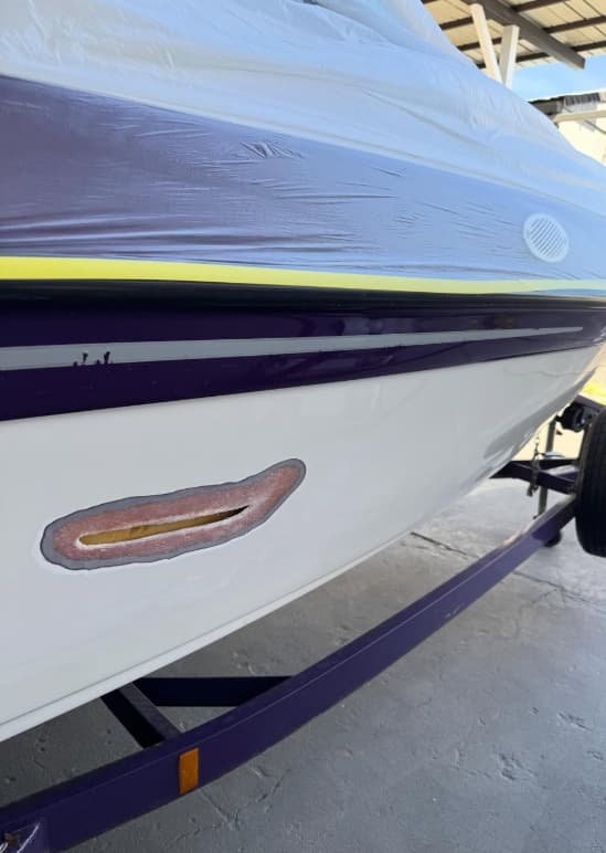 Before fiberglass repair at Sergio's Boat Spa, the best boat repair in Stockton, CA.