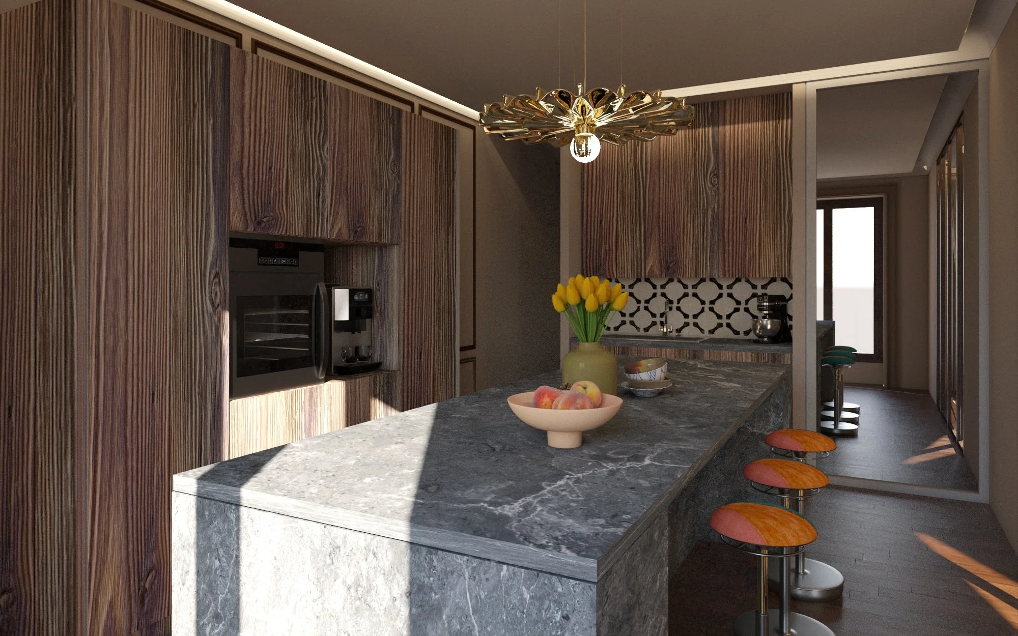 Une cuisine moderne avec un îlot en pierre, des meubles en bois foncé, un chandelier design au plafond, une corbeille de fruits et un vase de tulipes jaunes sur l'îlot, avec un espace bar avec des tabourets orange.
