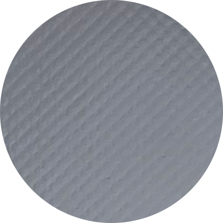Close-up of a textured white surface, possibly a paper towel or a napkin.