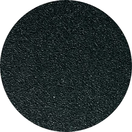 Close-up of a black textured circular surface.