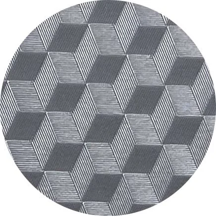 Black, white, and gray geometric surface with 3D cube pattern.