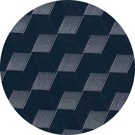 Close-up of a patterned fabric with a geometric design of dark and light rectangles.