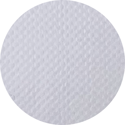Close-up of a textured white disposable paper towel or napkin.