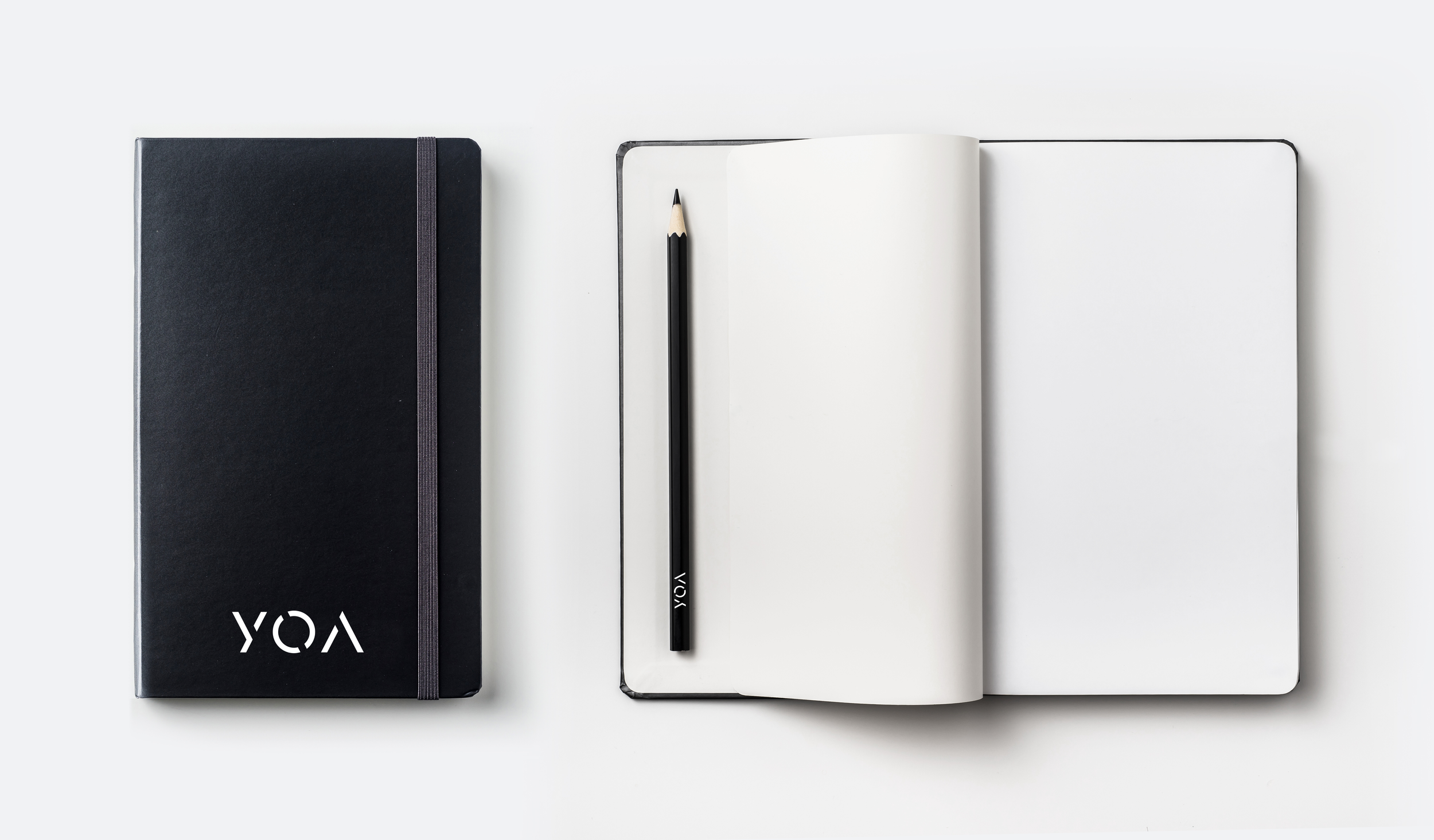 YOA_Buch+&+Bleistift.webp