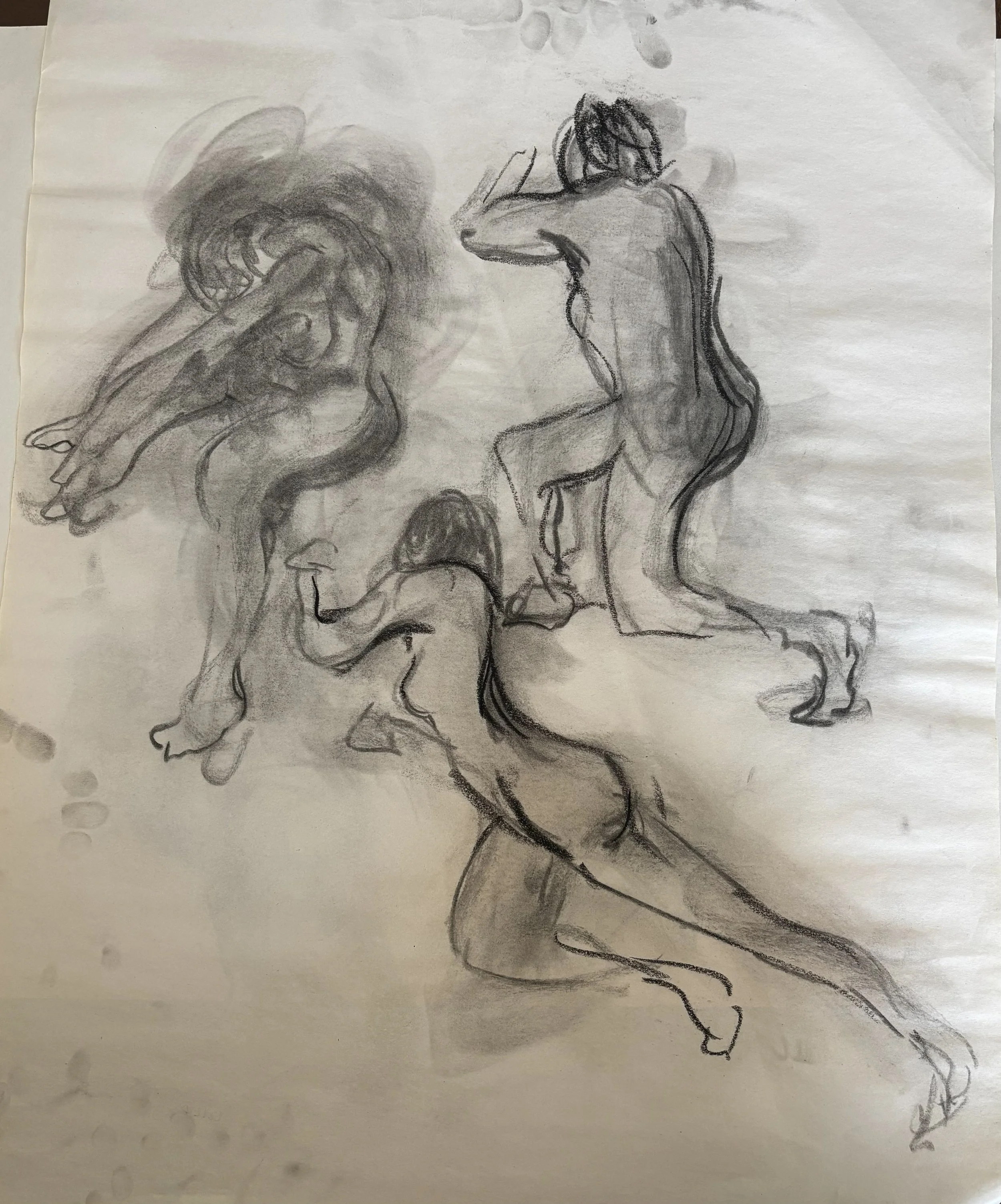 A charcoal sketch of a woman with long flowing hair, sitting, gazing behind her with one arm raised and bent at the elbow. 