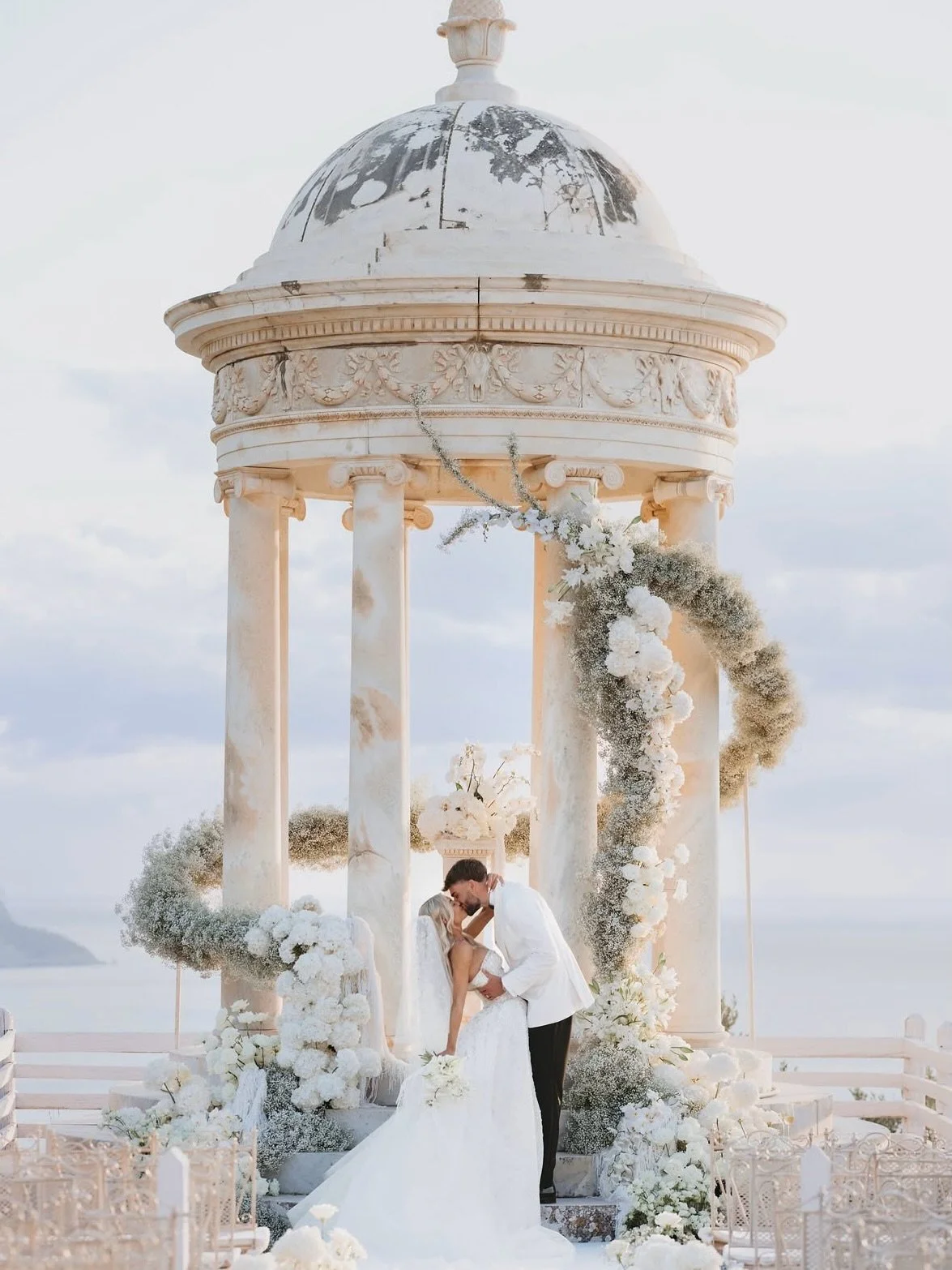 Congratulations to Mr and Mrs Clare 💍
The newlyweds celebrated their marriage in Majorca at Temple Son Marroig this past weekend, a month after their legal London wedding at Stockport Town Hall in Manchester, surrounded by their closest friends and 