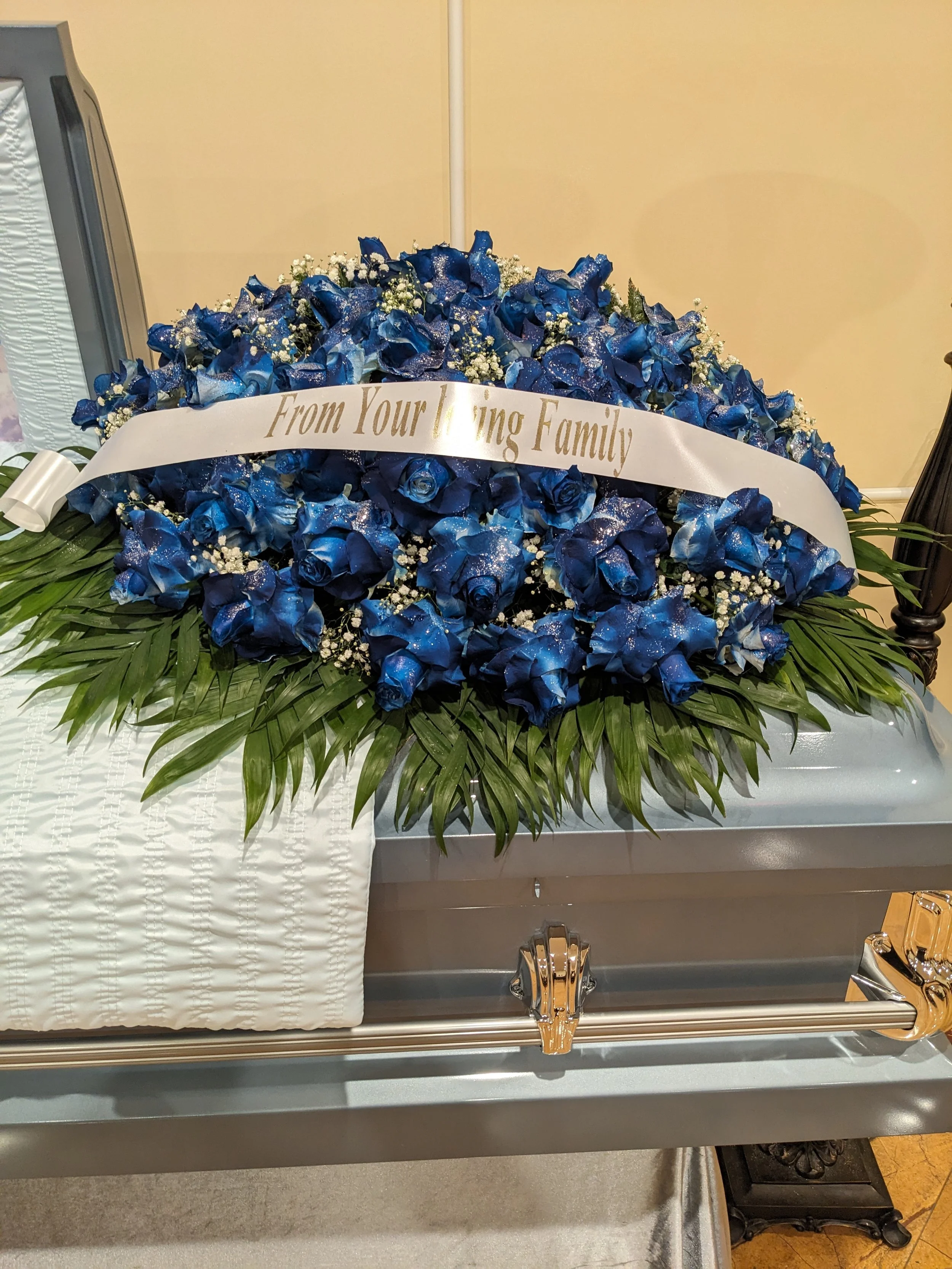 Elegant Blue Rose Funeral Tribute