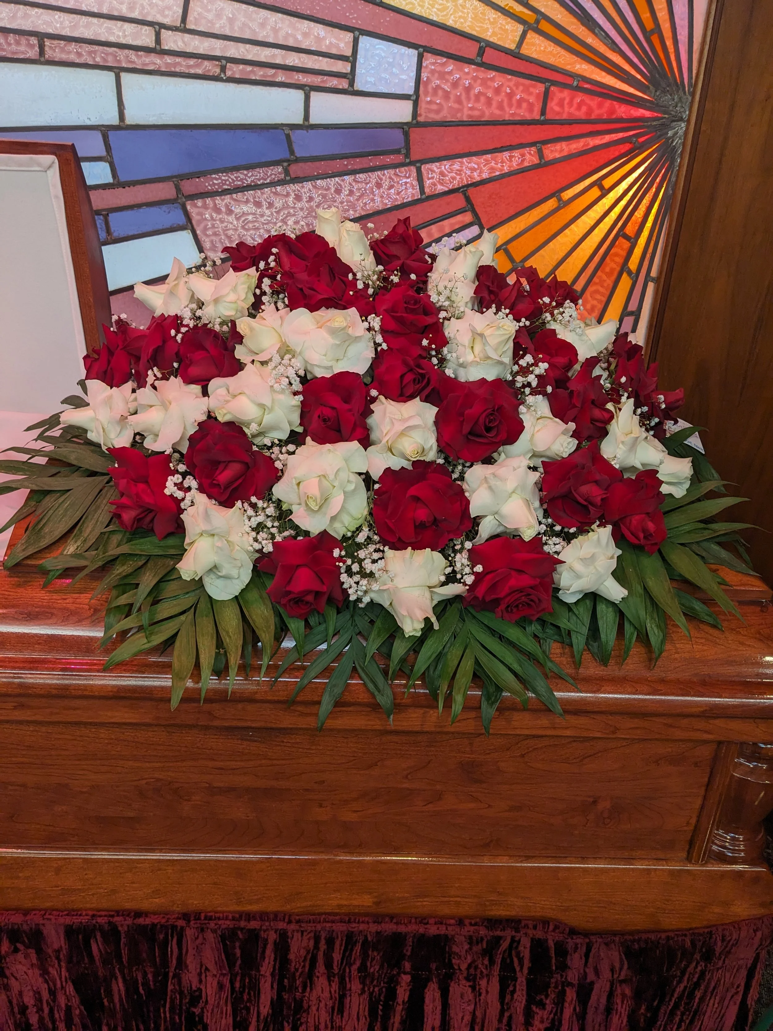 Stunning Rose Casket Arrangement