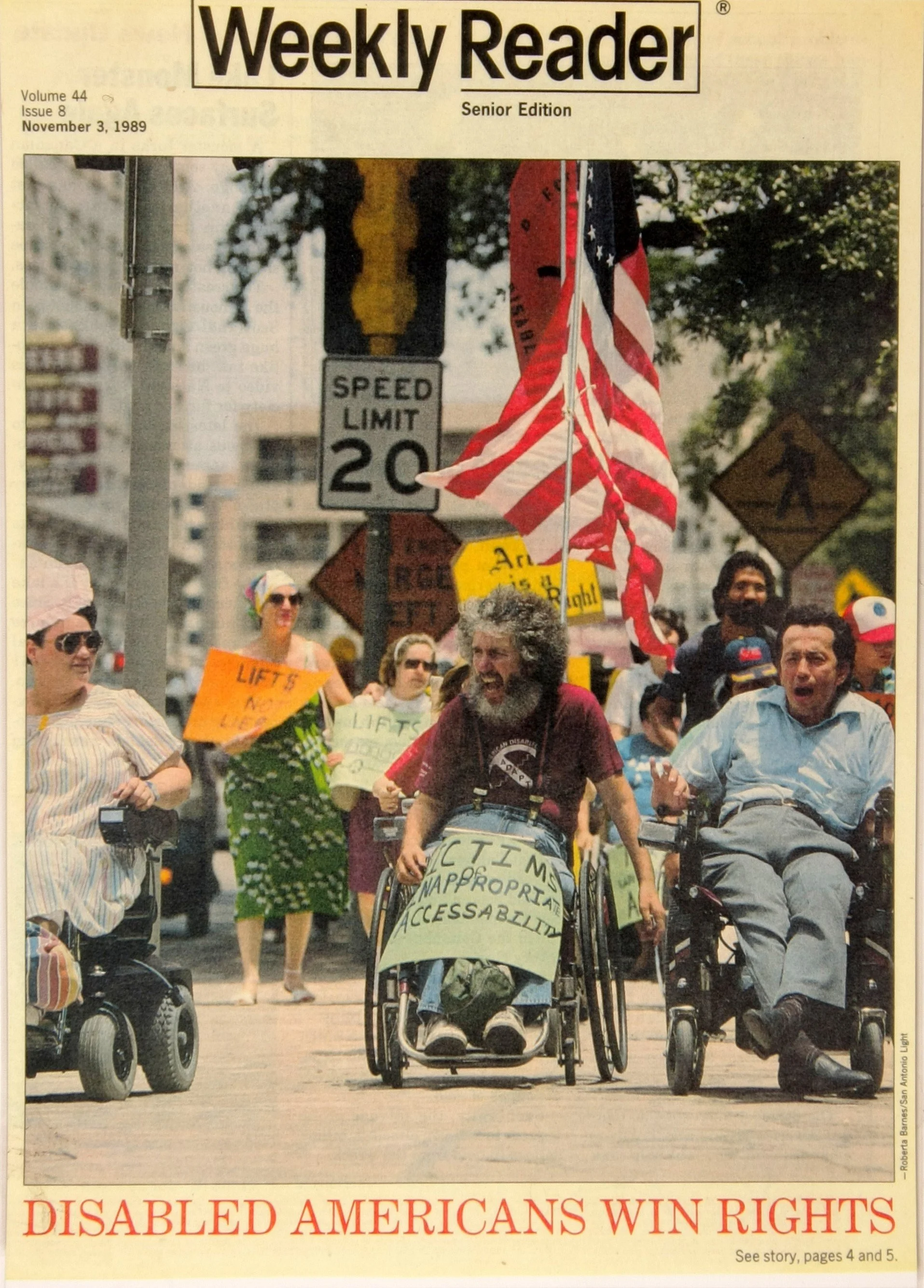 Cover of Weekly Reader, November 3, 1989, headlined Disabled Americans Win Rights, showing wheelchair users marching in a city street with signs reading Lifts not lies
