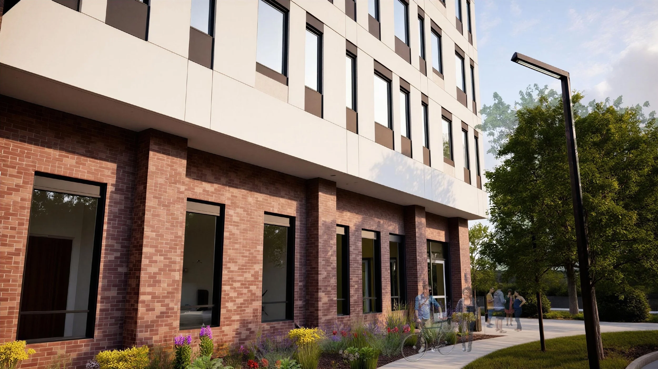 Street-level rendering of Liberty House, with tall ground-floor windows above a brick base and landscaped planting along the sidewalk