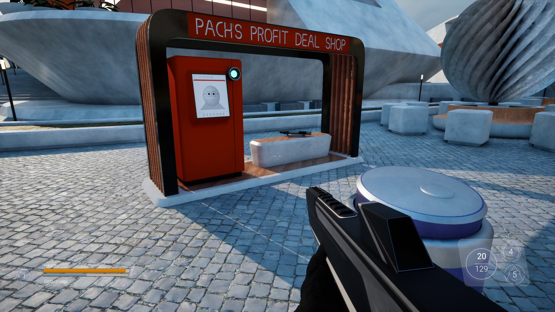 In a virtual environment, a first-person view. There is a red vending machine labeled 'PACH'S PROFIT DEAL SHOP' with a screen displaying a robot face, located near a seating area with benches and sculptures in the background. The scene is outdoors with a paved stone ground and modern architectural structures.