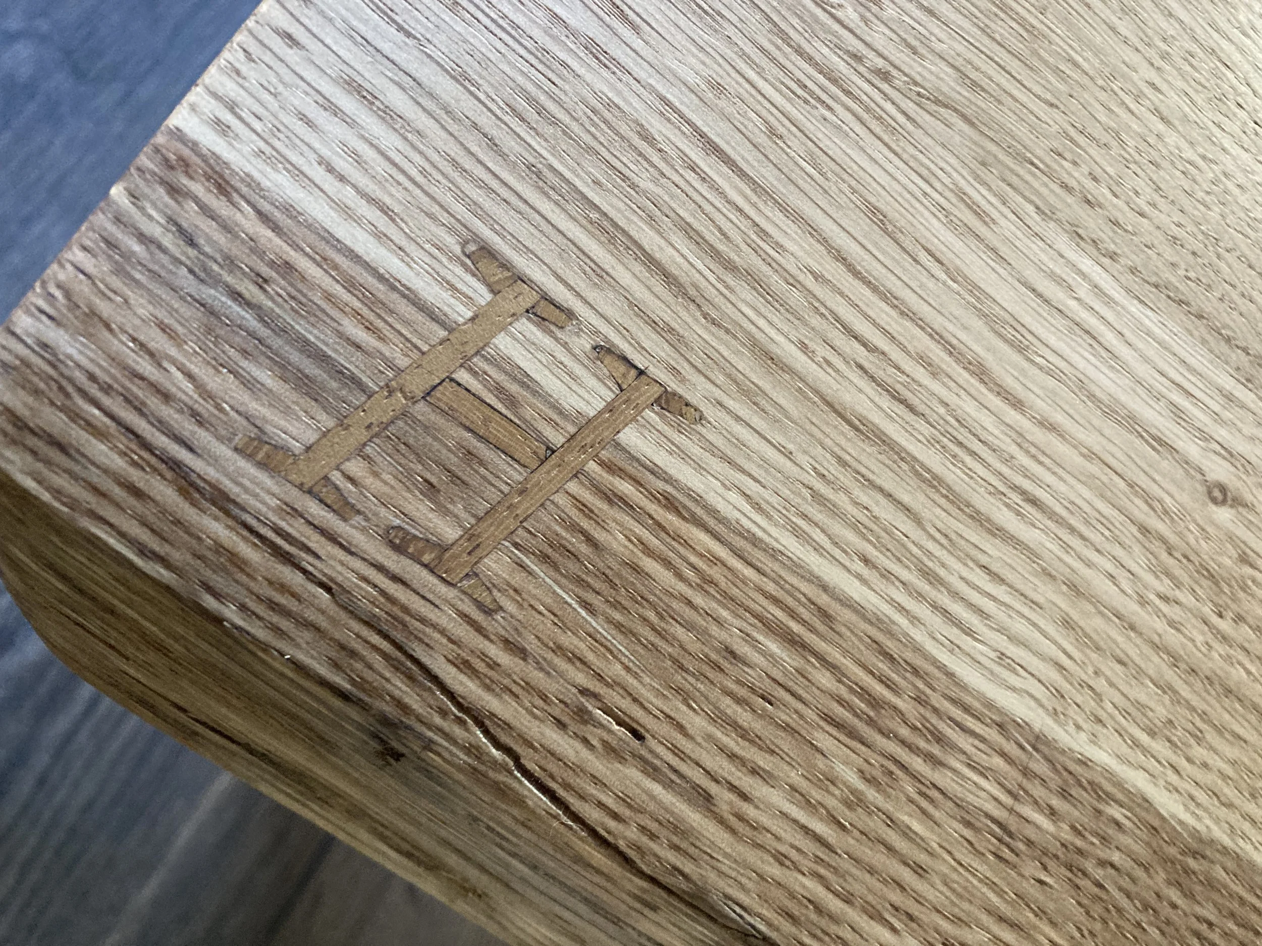 Inset lettering on oak footstool
