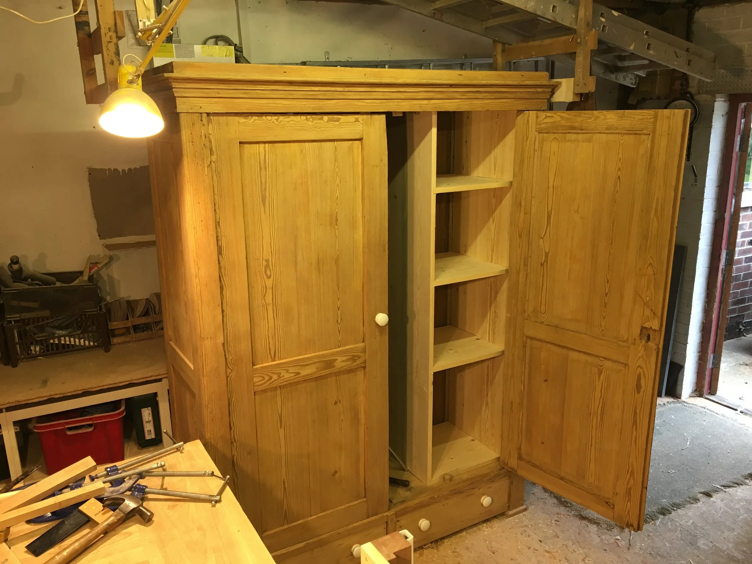 Refurbished oak wardrobe with added internal shelving