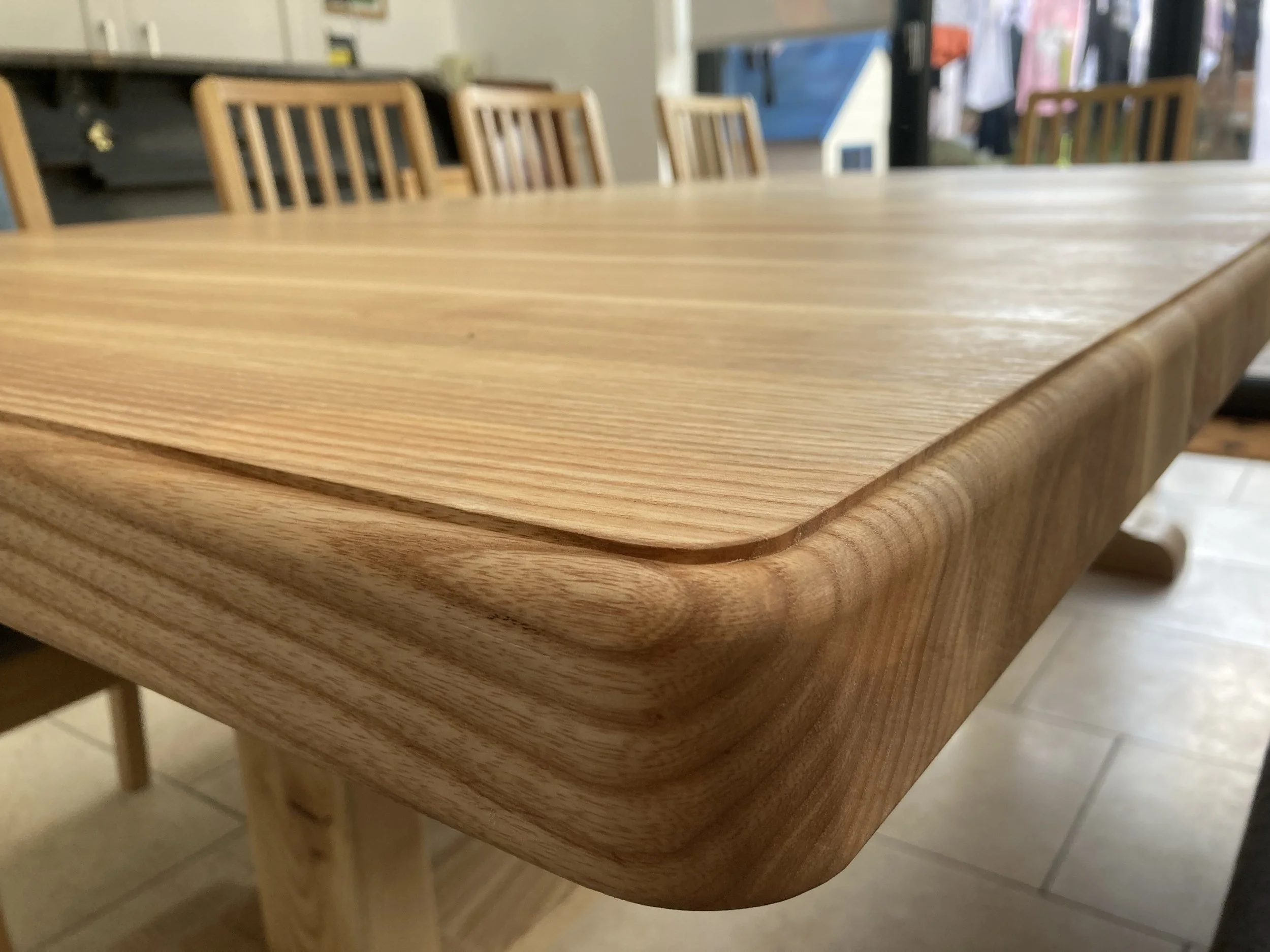 Large extendable dining table in ash