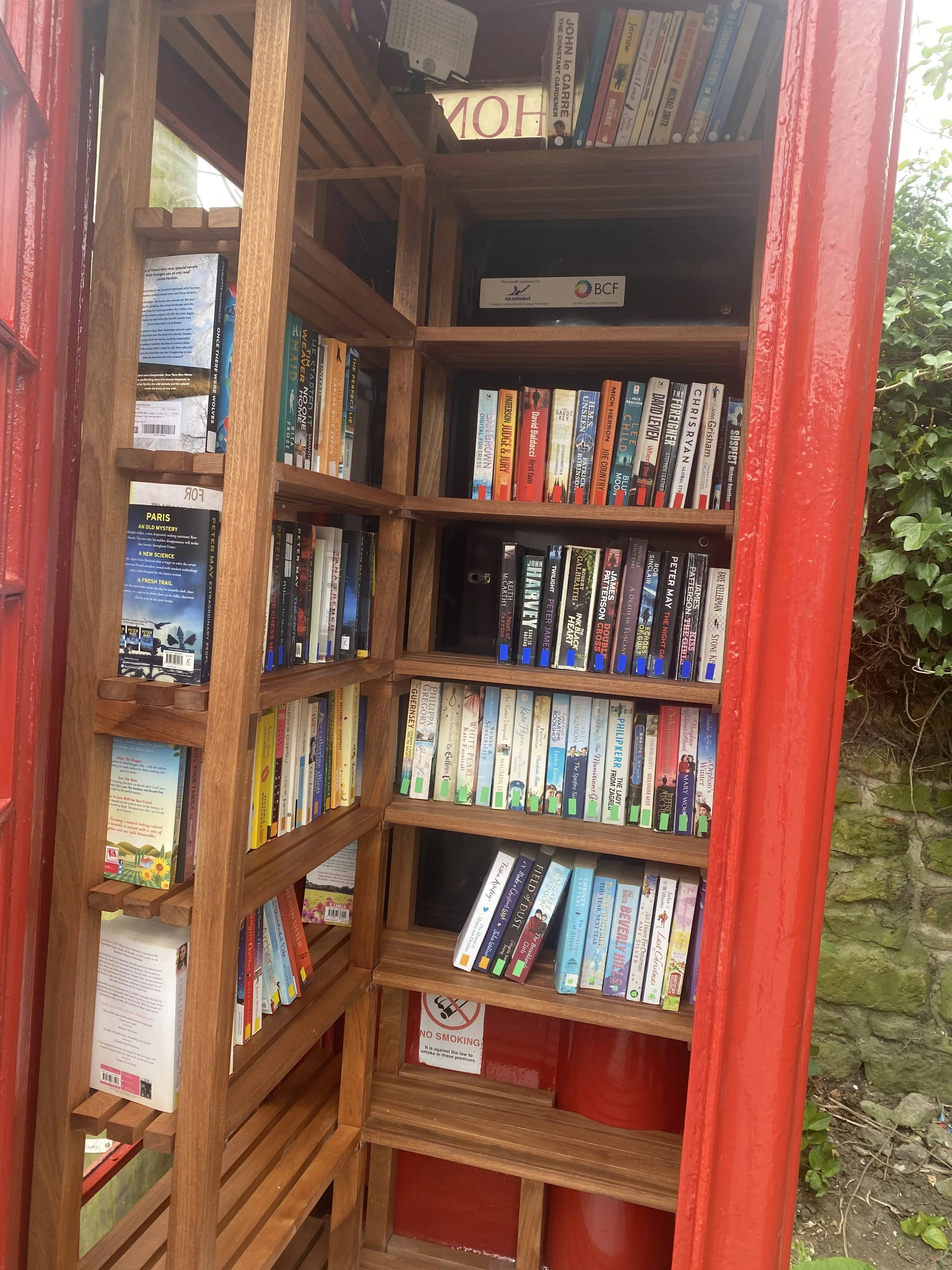 Village phone box library shelving