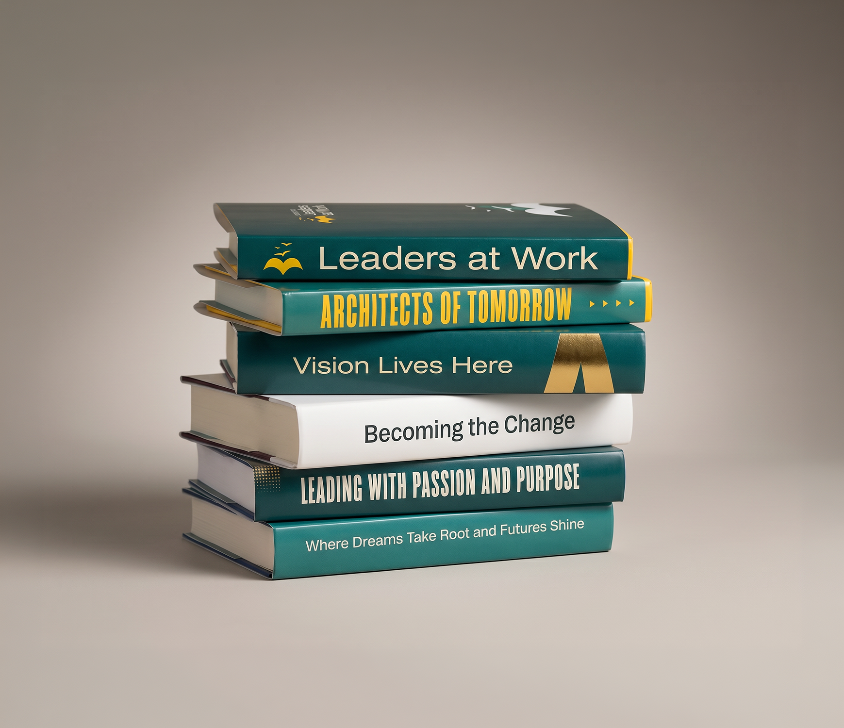 A stacked pile of books featuring motivational leadership titles including Leaders at Work, Architects of Tomorrow, and Vision Lives Here.