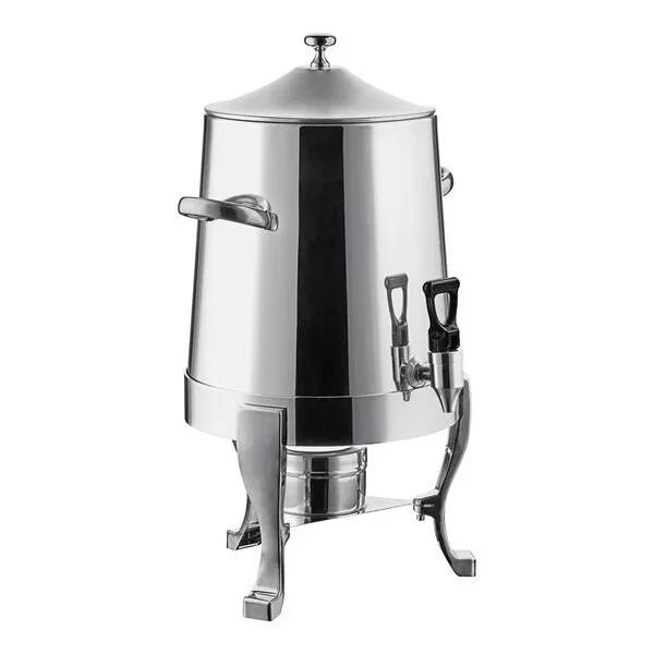 Stainless steel hot beverage dispenser with handles and a tap, standing on decorative legs.