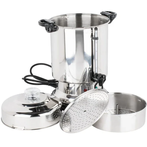 A stainless steel ice cream maker with a cylindrical freezing chamber, a lid, a paddle, and a bowl.