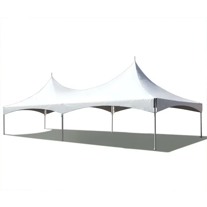 A large white outdoor event tent with multiple peaks and metal poles.