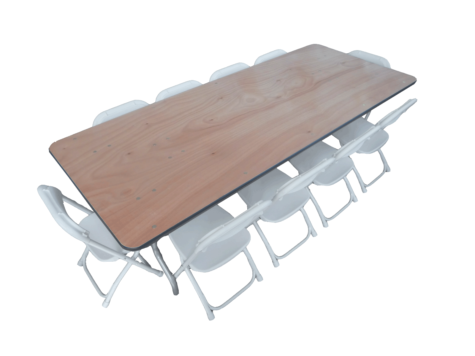 A wooden conference table surrounded by white folding chairs in a meeting room.