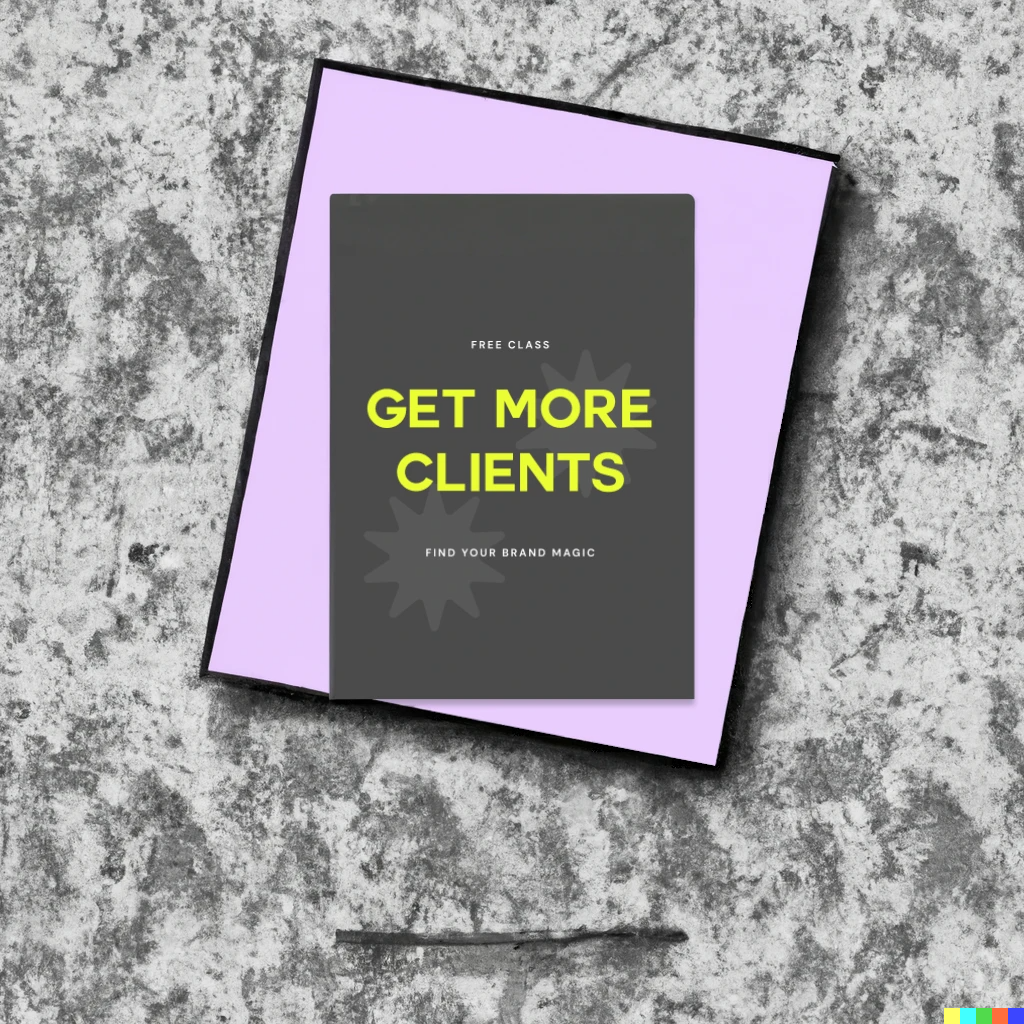 A black booklet titled "Get More Clients" with yellow text, placed on top of a lavender sheet of paper on a textured gray surface.