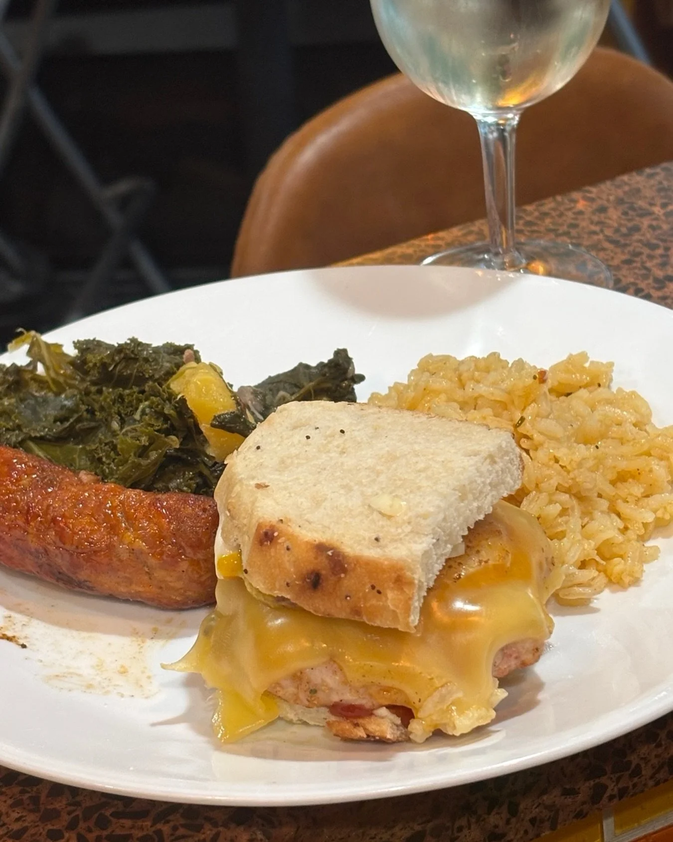Tonight I grilled hot Italian sausages, turkey cheeseburger sliders with greens garnished with pineapple and rice.