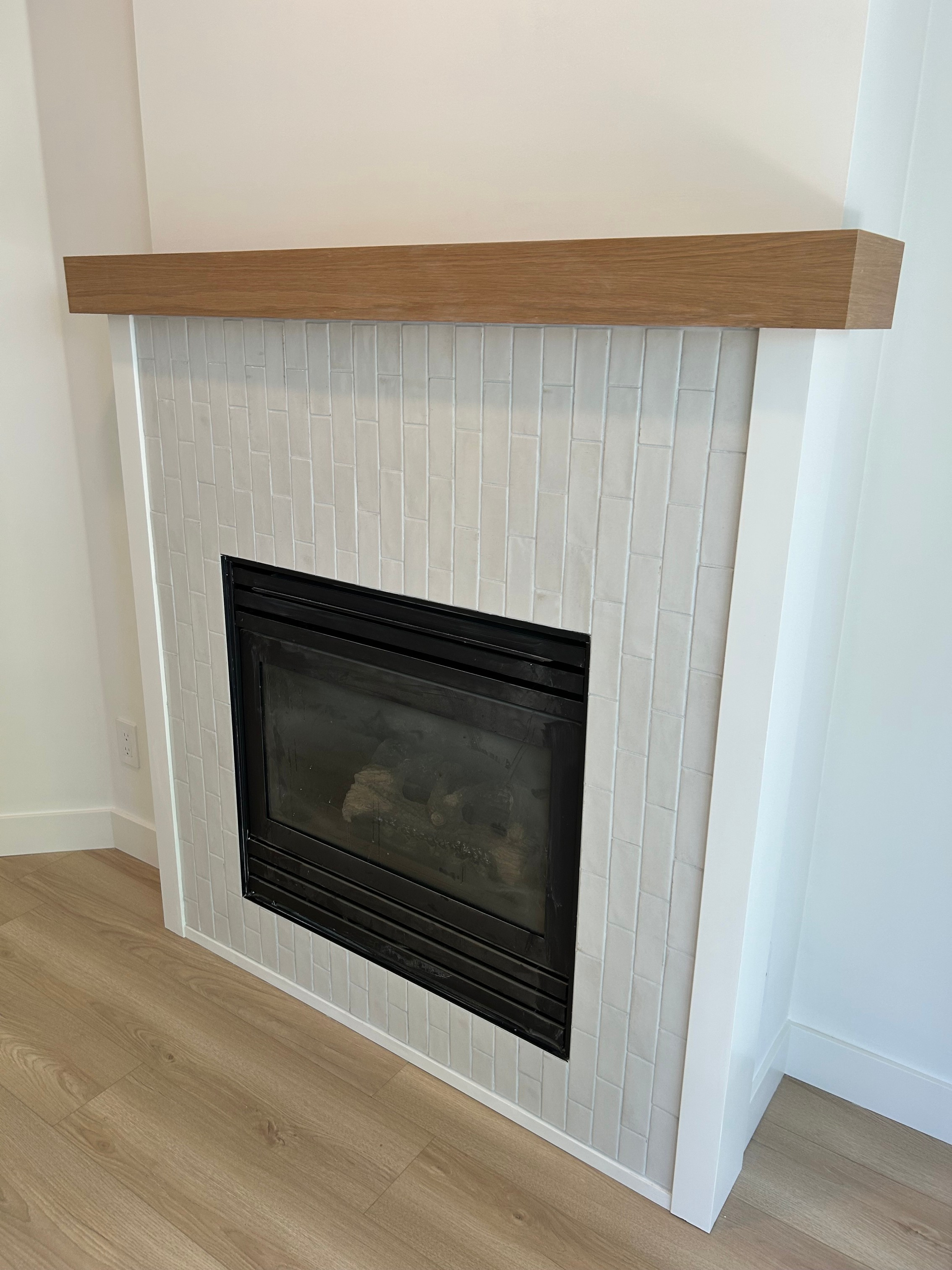 fireplace-renovation-custom-wood-white-oak-mantle.png