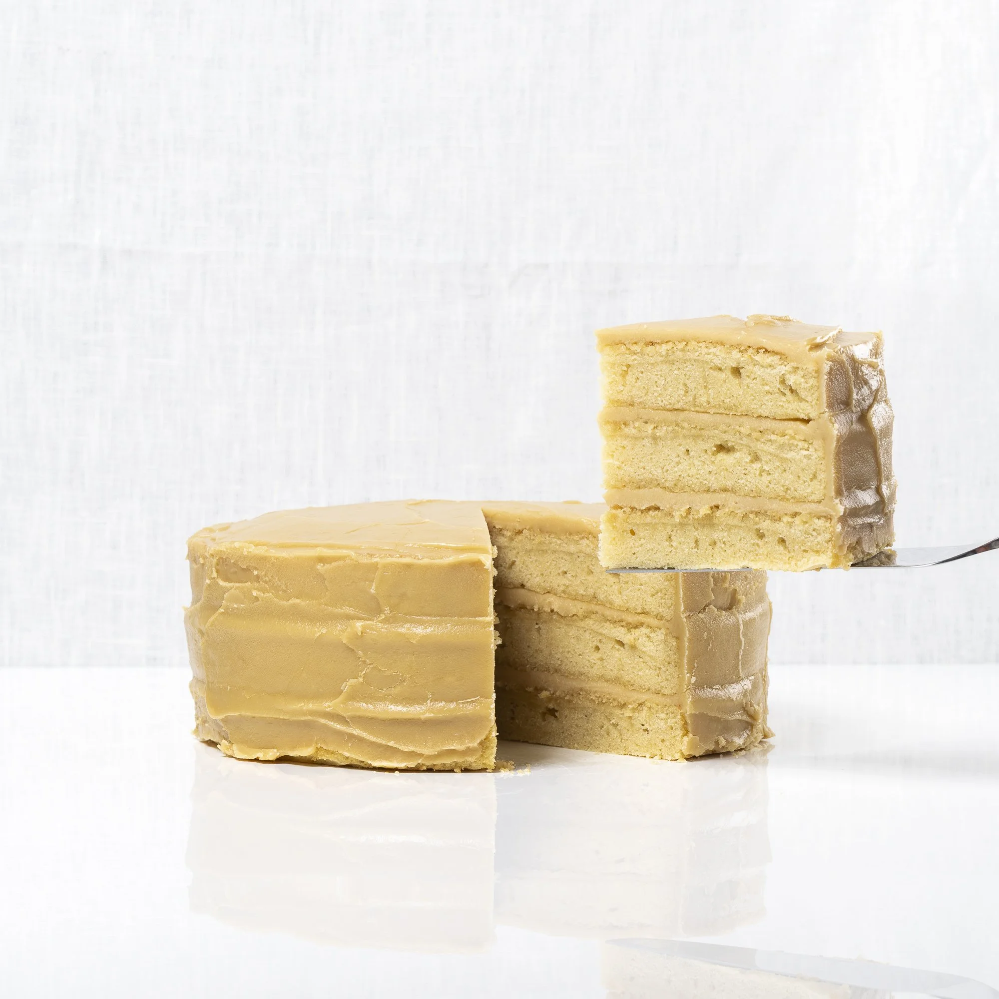 Caramel Cake - 

The moist, flavorful yellow cake is delicious all on its own. But once we’ve encased it in a thick, rich caramel frosting, this cake is Southern comfort at its pinnacle.  Show up anywhere with this beauty and you’ll always be invited